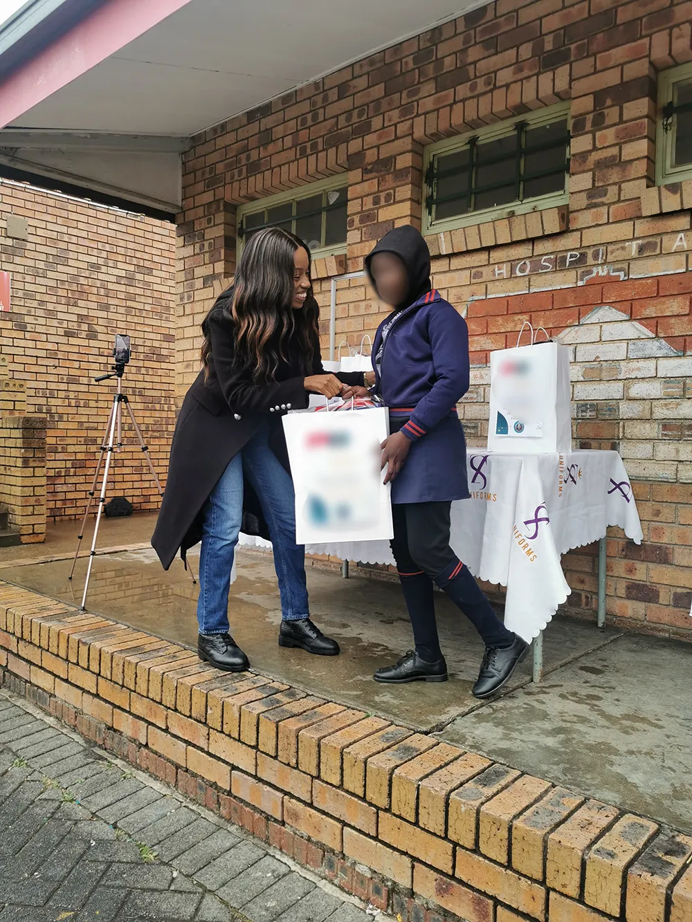 Dignity Packs handover to student