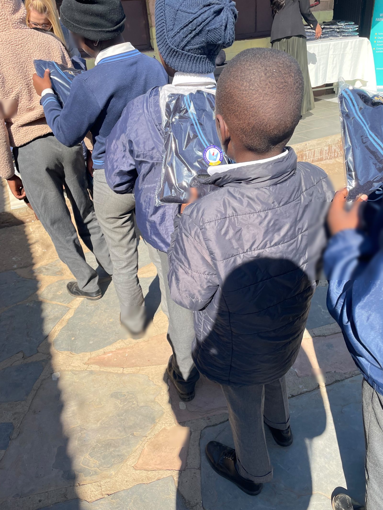 School jerseys being handed out to learners at Sindawonye Primary School, Mamelodi, 28 July 2026